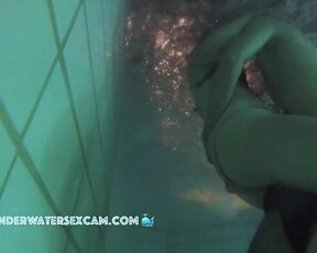 Underwater sex under waterfall