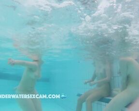 A group of girls talking about sex underwater