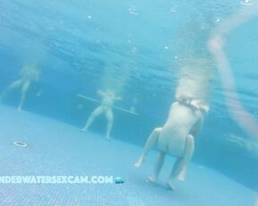 Natural tits in the warm water of the public sauna pool