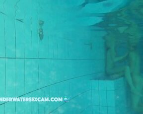 Sweet young teen 18+ couple is playing underwater