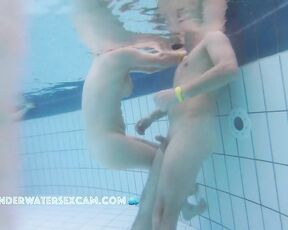Nice couple shows their shaved bodies underwater