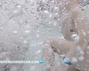 Three young girls have fun in jacuzzi