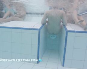 Nice couples on an underwater bench