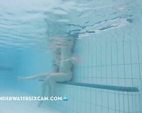 Two very different girls on an underwater bench