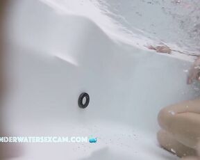 Big milf boobs in a jacuzzi