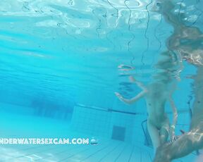 Very skinny girl swims in front of boyfriend