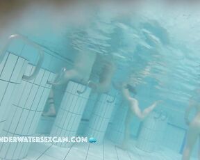 Three hot teen chicks running away underwater