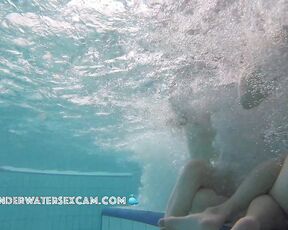 Two sweet young girls on an underwater bench