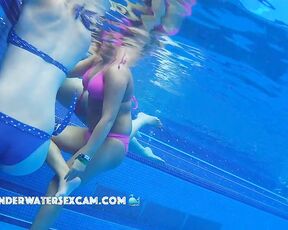 Three bikini hotties in a public pool