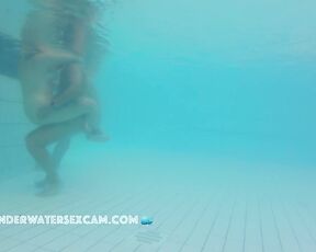 Group of horny young people in a public pool