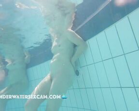 Natural woman alone and nude in the pool