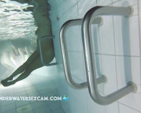 Is that underwater yoga? Performed in a public pool