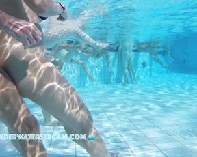 Hot older couple arouses each other underwater