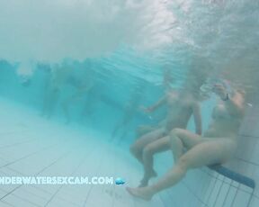 This couple enjoys the warm water in a sauna pool