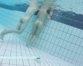 A pretty young girl attracts everyone's attention when she enters the pool