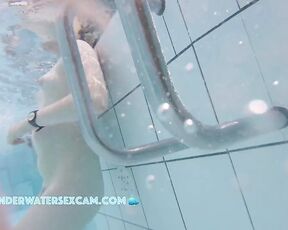 NEW! She is really cute and clearly enjoys being naked in the warm pool