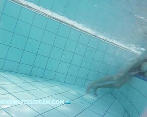 This young girl is surprised what you can do underwater if you are completely naked