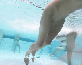 This well shaved lady has fun with the underwater jet in the sauna pool