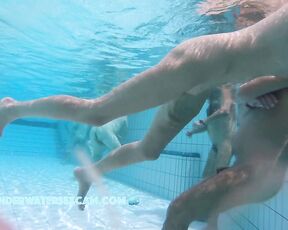 This well shaved lady has fun with the underwater jet in the sauna pool