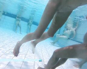 This well shaved lady has fun with the underwater jet in the sauna pool