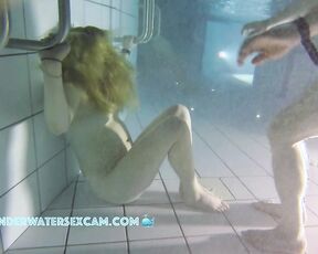 NEW! This red-haired beauty loves to dive underwater