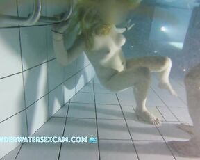 NEW! This red-haired beauty loves to dive underwater