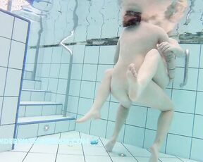 This lesbian couple is freshly in love and you can see it underwater too