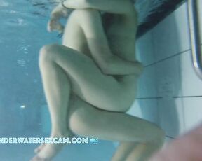 NEW! A pretty couple in the warm water of the outdoor pool in the evening