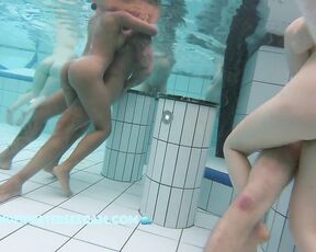 NEW! It's not easy to film two horny young couples in the sauna pool at the same time