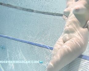 NEW! This sweet young woman is experiencing the benefits of an underwater massage jet for the first time in her life