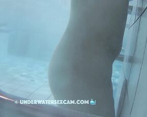 NEW! This sweet young woman is experiencing the benefits of an underwater massage jet for the first time in her life