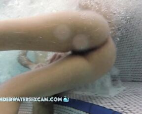 NEW! This hot couple is getting hornier and hornier in the jacuzzi and the voyeur is watching