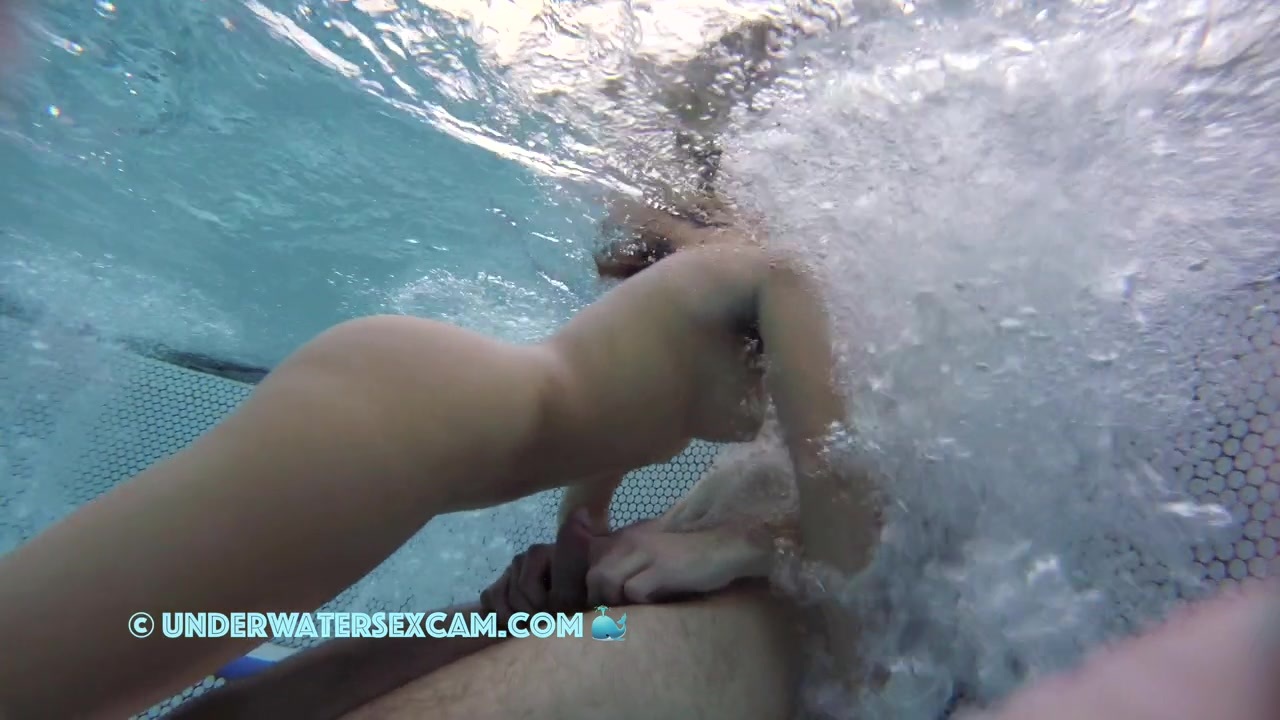 NEW! This hot couple is getting hornier and hornier in the jacuzzi and the voyeur is watching