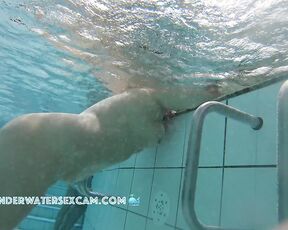 You can watch this cute chubby girl massaging her lower body with the underwater jet ;-) while the voyeur's hidden pool camera records everything in a public fkk resort