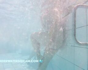 You can watch this cute chubby girl massaging her lower body with the underwater jet ;-) while the voyeur's hidden pool camera records everything in a public fkk resort