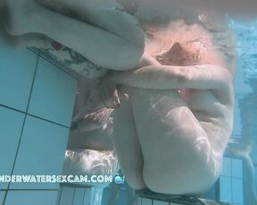 NEW! Sexy milf with big pierced breasts likes to show herself naked in the public sauna pool