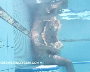 NEW! A young couple plays around in the water where he gets horny and wants more