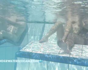 NEW! A young couple plays around in the water where he gets horny and wants more