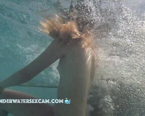 NEW! A young couple plays around in the water where he gets horny and wants more
