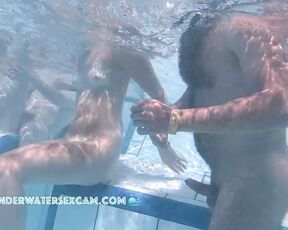 NEW! A young couple plays around in the water where he gets horny and wants more