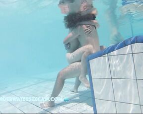 NEW! A young couple visibly enjoys playing together naked in the pool