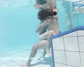 NEW! A young couple visibly enjoys playing together naked in the pool
