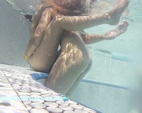 NEW! An underwater strap-on would be a nice idea for the two lesbians, wouldn't it?