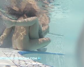 NEW! An underwater strap-on would be a nice idea for the two lesbians, wouldn't it?