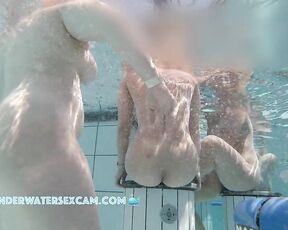 NEW! Two pretty young women sit on underwater stools and chat about dicks