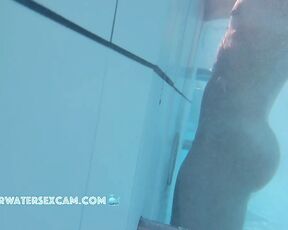 NEW! This little horny slut masturbates with the underwater jet and looks at my cock while doing so