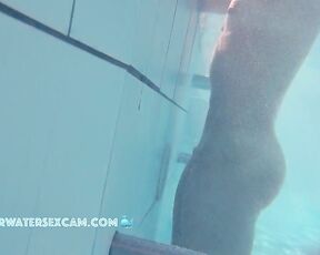 NEW! This little horny slut masturbates with the underwater jet and looks at my cock while doing so