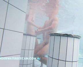 NEW! A pretty young couple playing in the water and I think she wants to do a lot more