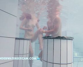 NEW! A pretty young couple playing in the water and I think she wants to do a lot more