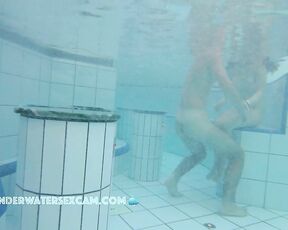 NEW! A pretty young couple playing in the water and I think she wants to do a lot more